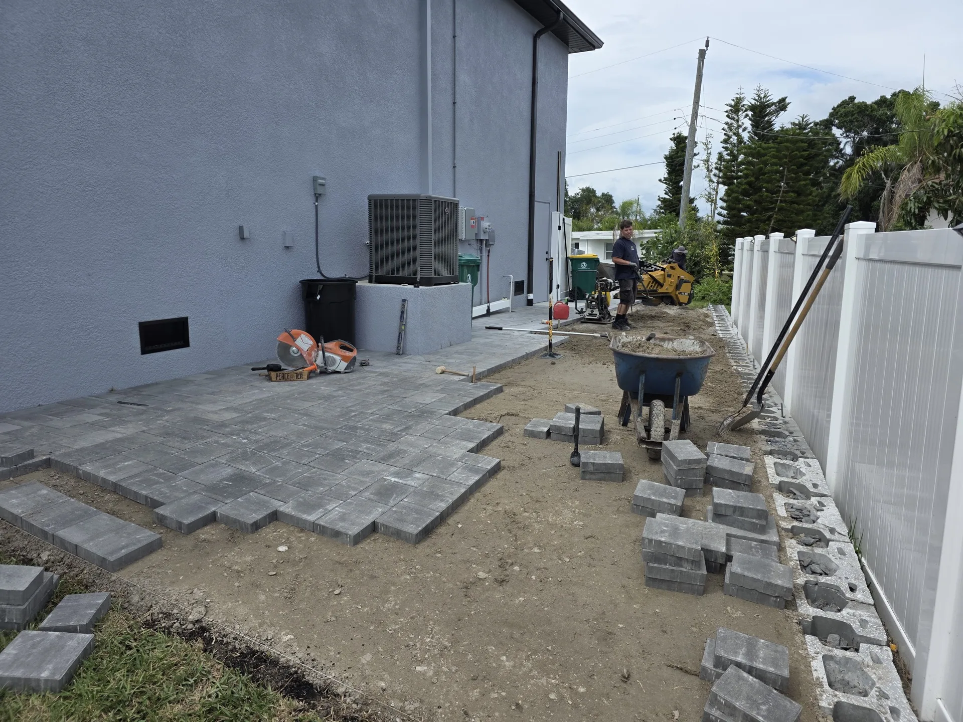 Travertine pool deck installation in Venice FL