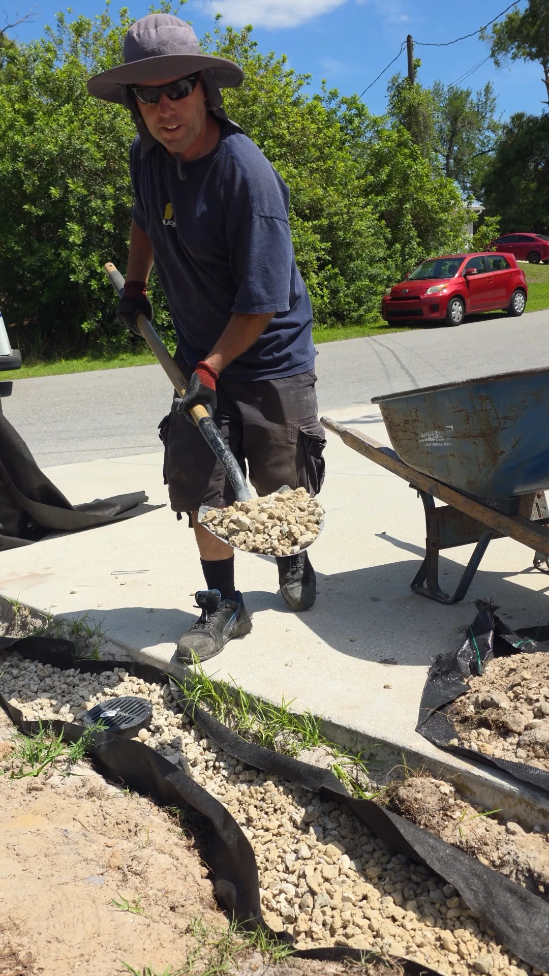 Rock bed and edging installation at Venice FL home