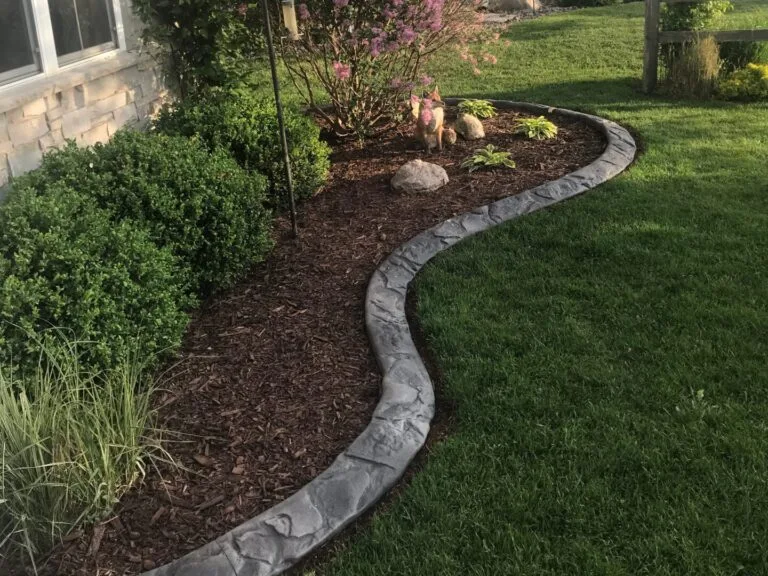 Rock bed conversion with concrete curbing in Englewood FL